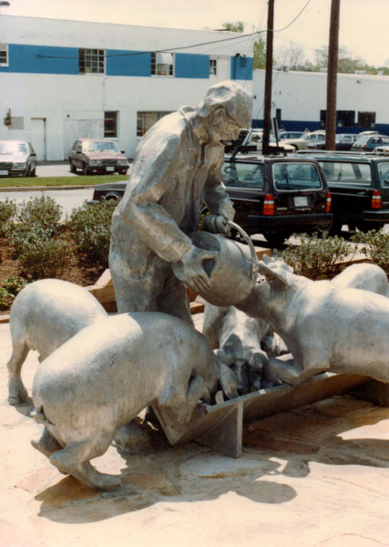 Man Slopping Pigs